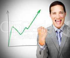 Businessman celebrating behind increasing graph
