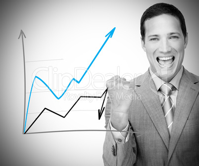 Businessman standing behind graph cheerin