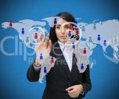 Woman touching blue world map interface