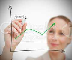 Woman drawing growth graph