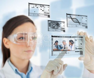 Laboratory technician selecting images