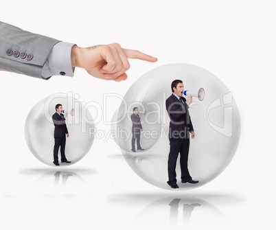 Three businessmen standing in bubble wih megaphone