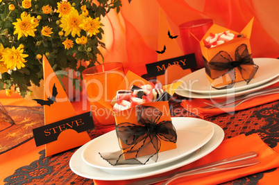 Festive table with gifts for Halloween