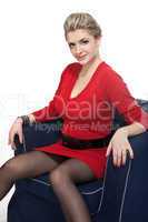 Woman sitting on arm chair