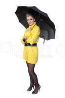Woman in yellow coat, shoes and umbrella