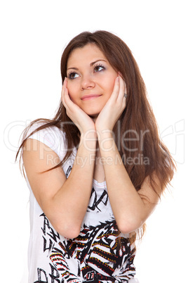 Beautiful thoughtful woman looking up