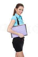 Beautiful student is holding books