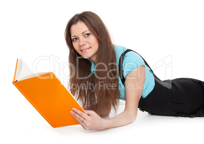 Beautiful student is reading a book