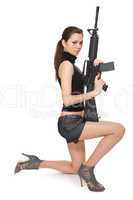Beautiful girl holding a rifle