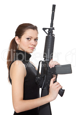 Beautiful girl holding a rifle