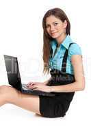 Woman student sitting with laptop