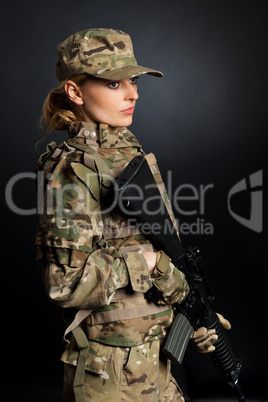 Army girl with rifle