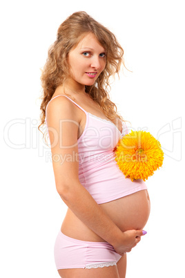 Pregnant woman is caressing her belly