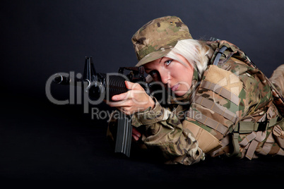 Beautiful army girl with rifle