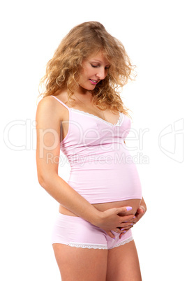 Pregnant woman is caressing her belly