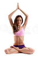 Practicing Yoga. Young woman. Lotus