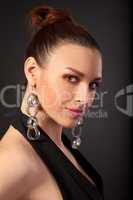 Portrait of beautiful woman with cute earrings