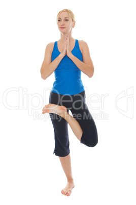 Practicing Yoga. Young woman