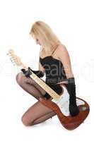 Lovely girl with electric guitar