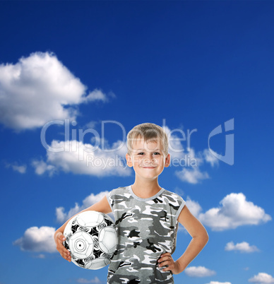 Boy holding soccer ball