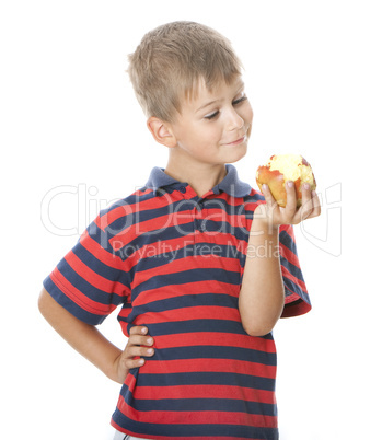 Boy holding an apple