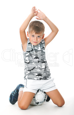 Boy holding soccer ball