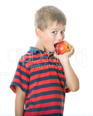 Boy holding an apple