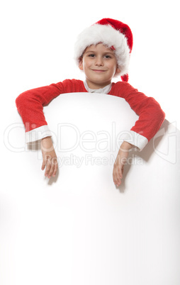 Boy holding a christmas poster