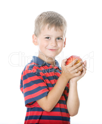 Boy holding an apple