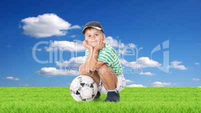 Boy holding soccer ball