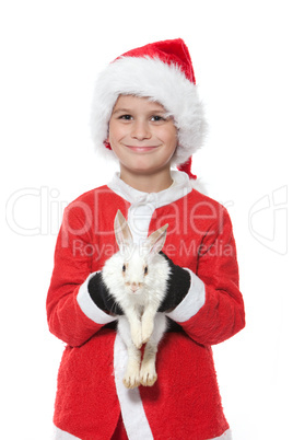 Boy holding a christmas rabbit