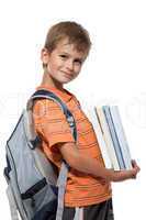 Boy holding books