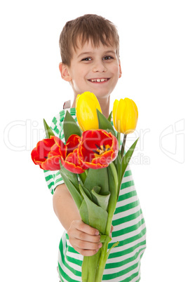 Young boy holding tulips