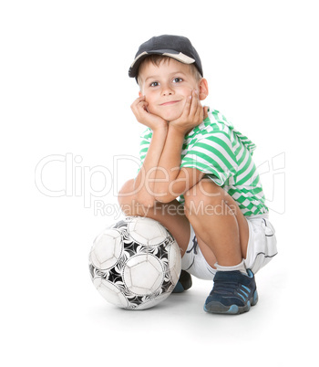 Boy holding soccer ball