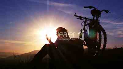 Mountain biker sunset silhouette