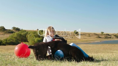 Woman Having Fun With Their Newfoundland Dogs Outdoor