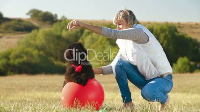 Woman Playing With Puppy Newfoundland Outdoor