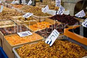 Organic Different Types Of Nuts and Dried Fruits At A Street Mar