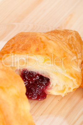 croissant French brioche filled with berries jam