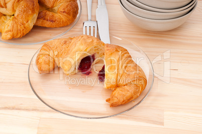 croissant French brioche filled with berries jam