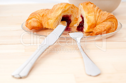 croissant French brioche filled with berries jam