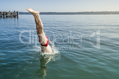 jumping into the water