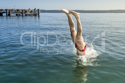 jumping into the water