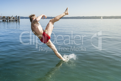 jumping into the water