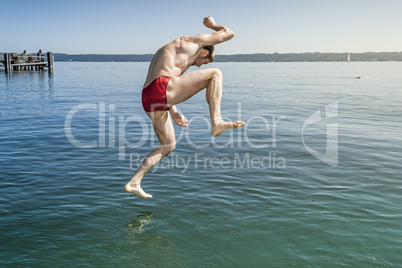 jumping into the water