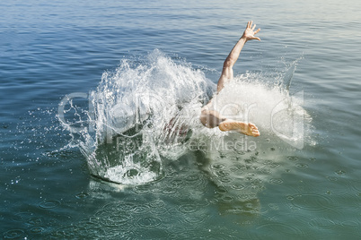 jumping into the water