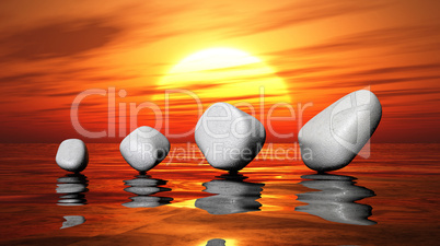 White stones on sunset water
