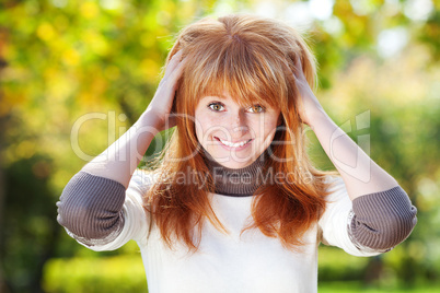 portrait of a beautiful young redhead teenager woman