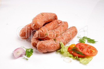 Sausages with fresh vegetables