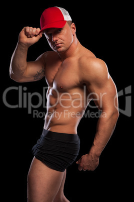 Sexy muscular man with baseball cap